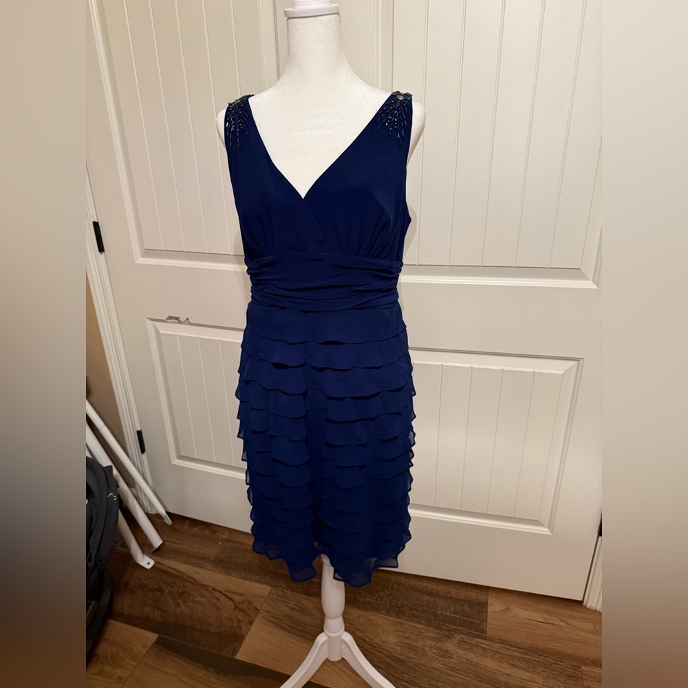 S. L. Fashions deep blue evening dress